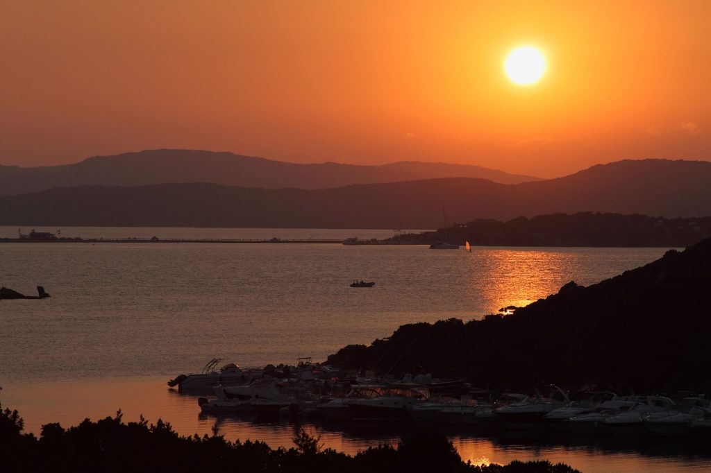 image of porto rafael, sardinia, at sunset